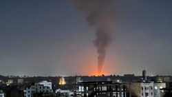 Smoke rises in the sky following US-led airstrikes in Sanaa, Yemen, in February.