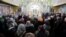 Люди у церкві в селі Шандровець Турківського району Львівської області з новим настоятелем