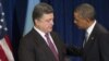 Poland -- US President Barack Obama and President-elect Petro Poroshenko of Ukraine talk during a meeting in Warsaw, June 4, 2014