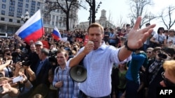 Aleksei Navalny addresses supporters during an unauthorized anti-Putin rally on May 5, 2018, in Moscow, two days ahead of Vladimir Putin's inauguration for a fourth Kremlin term.