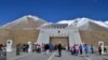 FILE: People gather at the 4730 meter (15,520 ft) high Khunjerab Pass, a high mountain pass, which also seres as border crossing between Chin and Pakistan.