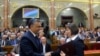 Orbán Viktor miniszterelnök gratulál Karas Monikának, a Nemzeti Média- és Hírközlési Hatóság (NMHH) Médiatanácsa megválasztott elnökének az Országgyűlés plenáris ülésén 2013. szeptember 9-én.