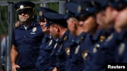 Georgian police stand guard outside a city court building during the trial of a former prime minister, Ivane Merabishvili, in Kutaisi in September.