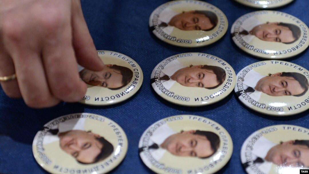 Pins bearing portraits of Sergei Magnitsky, for which the Magnitsky Act was named.