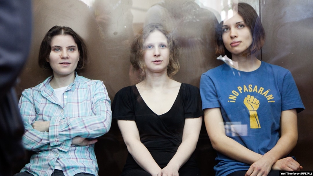 The three convicted members of Pussy Riot in a Moscow courtroom on August 17