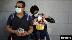 Հարավային Կորեա - Մայրաքաղաք Սեուլի բնակիչները՝պաշտպանիչ դիմակներով, հունիս, 2015թ․