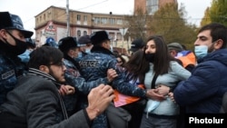 Armenia -- Opposition protesters scufle with riot police, Yerevan, December 8, 2020.