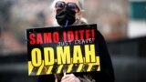 BOSNIA-HERZEGOVINA -- A woman holds a sign during a protest urging the government to obtain coronavirus disease (COVID-19) vaccines, in Sarajevo, April 6, 2021