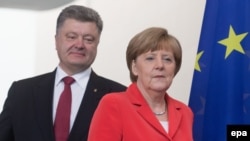 Petro Poroshenko və Angela Merkel