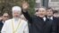 Kazakh President Nursultan Nazarbaev waves next to Absattar Derbisali, the supreme mufti of Kazakhstan, as he visits the Central Mosque in Almaty in November 2010.