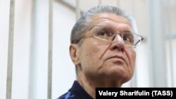 Former Russian Economy Minister Aleksei Ulyukayev attends his bribery trial in Moscow on August 16.
