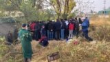 People attend a funeral ceremony on November 7 for one of the border guards killed in an attack the previous day that has been claimed by Islamic State. 