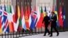French President Emmanuel Macron and Ukrainian President Volodymyr Zelenskyy walk at the Elysee presidential palace in Paris on September 4.