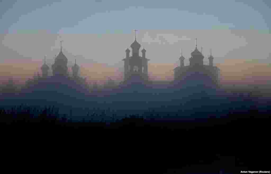 The Nikolo-Vyazhischsky Women&#39;s Monastery is seen through fog in the village of Vyazhishchi in the Novgorod region of Russia. (Reuters/Anton Vaganov)