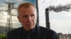 Христо Ковачки. На фона са електрически стълб и комините на ТЕЦ "Брикел". Колаж