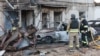 Emergency workers at the site of a Russian strike on Zaporizhzhya, Ukraine, on September 22.