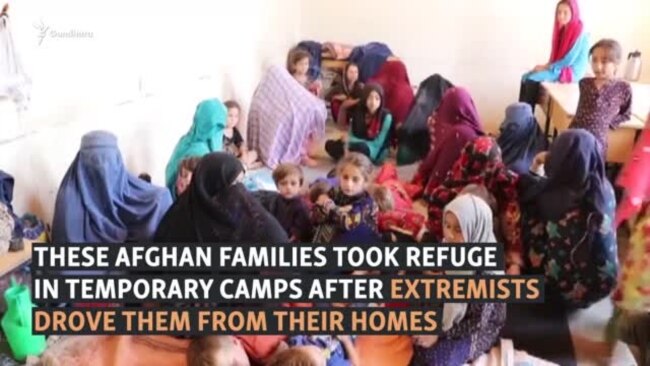 'They Would Cut Us Into Pieces': Afghan Civilians Flee Taliban Attacks In Kunduz
