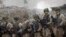 Литвалык аскерлер Вильнюстун түндүгүндөгү машыгуу полигонунда өтүп жаткан аскердик машыгуусуна катышууда. 2024-жыл, май.