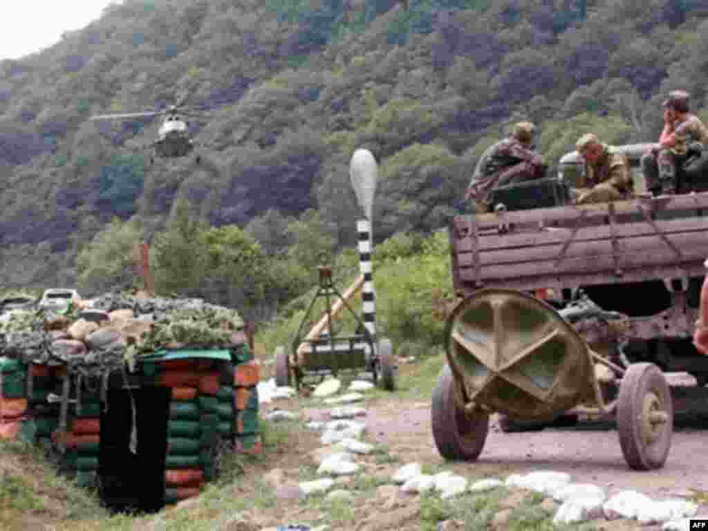 GEORGIA, CHKHALTA : Picture taken on August 12, 2008 shows an Abkhazian helicopter in the remote Kodori Gorge of Georgia's breakaway Abkhazia region landing in the town of Chkhalta. Abkhaz separatist soldiers drove Georgian forces out of Chkhalta and took control of the town. The leaders of two Russian-backed rebel regions, South Ossetia and Abkhazia, ruled out talks with Georgia's leaders, accusing them of war crimes