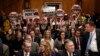 Code Pink protesters yell behind CIA Director Mike Pompeo as he waits to testify before a Senate Foreign Relations Committee confirmation hearing on Pompeo's nomination to be secretary of state on Capitol Hill in Washington, April 12, 2018. FILE PHOTO