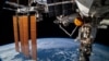 NASA woke the sleeping, seven-member crew of the International Space Station and sent them scrambling for refuge in a docked spacecraft.