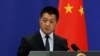 CHINA -- Chinese Foreign Ministry spokesman Lu Kang answers questions about a major bus accident in North Korea, during a news conference in Beijing, April 23, 2018