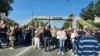 Environmental activists and local residents block roads in Serbia to protest the planned development of a lithium mine on October 19.