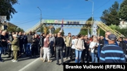 Environmental activists and local residents block roads in Serbia to protest the planned development of a lithium mine on October 19.