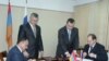 Armenia -- Defense Minister Seyran Ohanian (L) and Konstantin Biryulin, deputy head of Russia’s Federal Service for Military-Technical Cooperation, sign an agreement on arms sales to thrid countries on December 17, 2009.