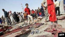 The site of a bomb blast outside a Shi'ite mosque in northeastern Baghdad in July