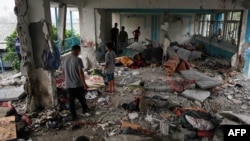 O încăpere a școlii UNRWA transformată în refugiu pentru palestinieni, după bombardamentul israelian din 6 iunie. 