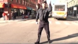 U.S. Policeman Directs Traffic With Dance Moves
