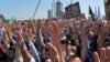 Muslims rally in Grozny's Akhmat Kadyrov Square in support of Rohingya Muslims in Burma on September 4.