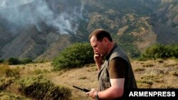 Armenia - Minister for Emergency Situations Davit Tonoyan coordinates firefighting efforts at the Khosrov nature reserve, 14Aug2017.