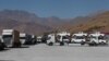 Trucks are seen at Haj Omran border between Iran and Iraqi Kurdistan, October 14, 2017