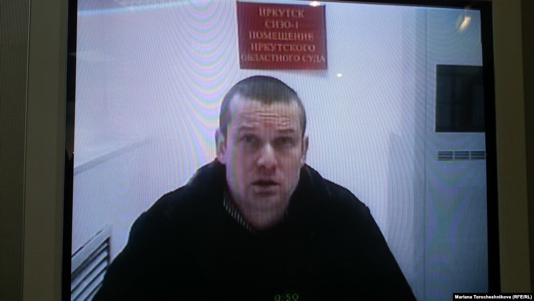 Leonid Razvozzhayev appears via video link at the Moscow City Court on January 21.