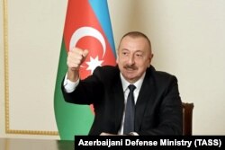 Президент Азербайджана Ильхам Алиев во время видеообращения к гражданам, в котором говорится о переходе Агдамского района под контроль Баку.