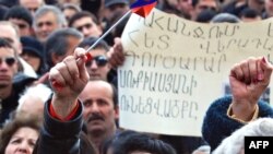 Armenians rally to commemorate the victims of police violence during presidential elections, in Yerevan, in March.