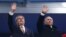 Томас Бах и Владимир Путин на открытии Олимпиады в Сочи 2014 г.   