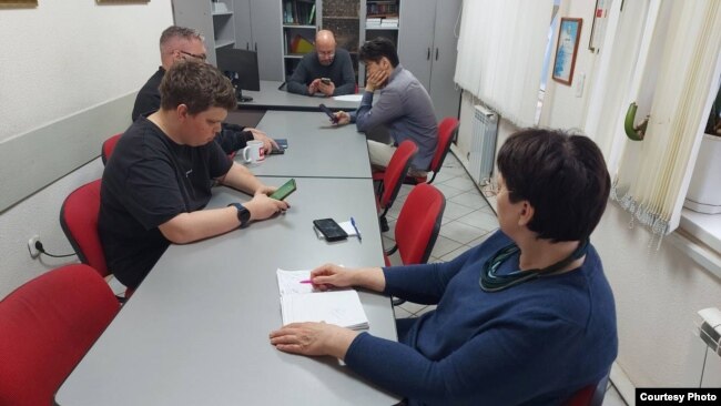 Journalists of the publication "Nasha Gazeta" in their editorial office