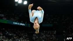 Romania's Sabrina Maneca-Voinea competes in the artistic gymnastics women's floor exercise final during the Paris 2024 Olympic Games at the Bercy Arena in Paris on August 5.