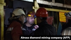 Rescue workers at the Mir diamond mine in Siberia 