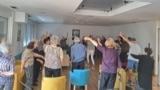 Users of the Home of the Elderly practice yoga, Podgorica, Montenegro 01