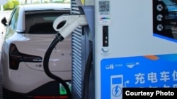 Электроунаа кубаттагыч. Иллюстрациялык сүрөт.