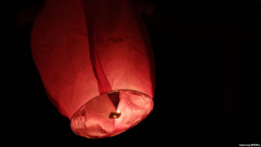Ukraine, Crimea, Russia - In Crimea, passed the action "Light a flame in your heart!" - Crimean Tatars in memory of the deportation of his people ran into the sky, "Chinese lanterns".17May2015