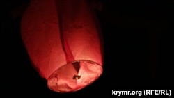 Ukraine, Crimea, Russia - In Crimea, passed the action "Light a flame in your heart!" - Crimean Tatars in memory of the deportation of his people ran into the sky, "Chinese lanterns".17May2015