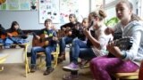 BiH-Srebrenica, young scolars participants of music school founded by the help of Austrian humanitarians