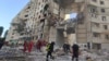 Rescue teams at the scene of a Russian strike on an apartment block in Kharkiv on September 24.&nbsp;<br />
<br />
Kharkiv Mayor Ihor Terekhov announced that two residential areas in the northeastern city of Ukraine had been hit with Russian glide bombs, killing at least three people.&nbsp;