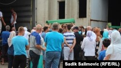 Coffins which contain the remains of victims of the massacre delivered to Srebrenica for a final burial. 