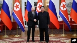Путин и Ким Џонг Ун, Пјонгјанг 19.06.2014